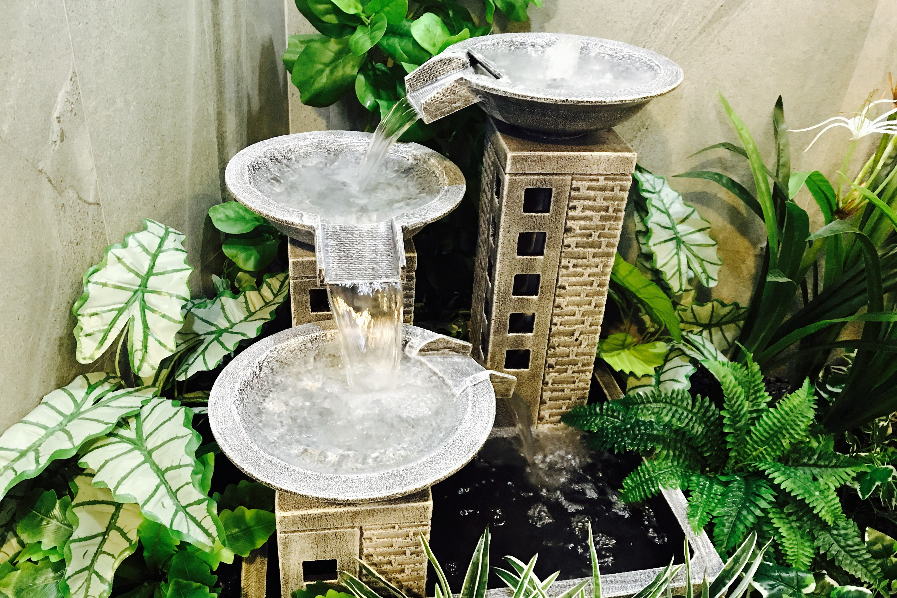 If you're looking for a little peace and quiet, or a way to be more mindful, you need to add one of these indoor water fountains to your home. This indoor water fountain with plants will be the most relaxing place in your home. 